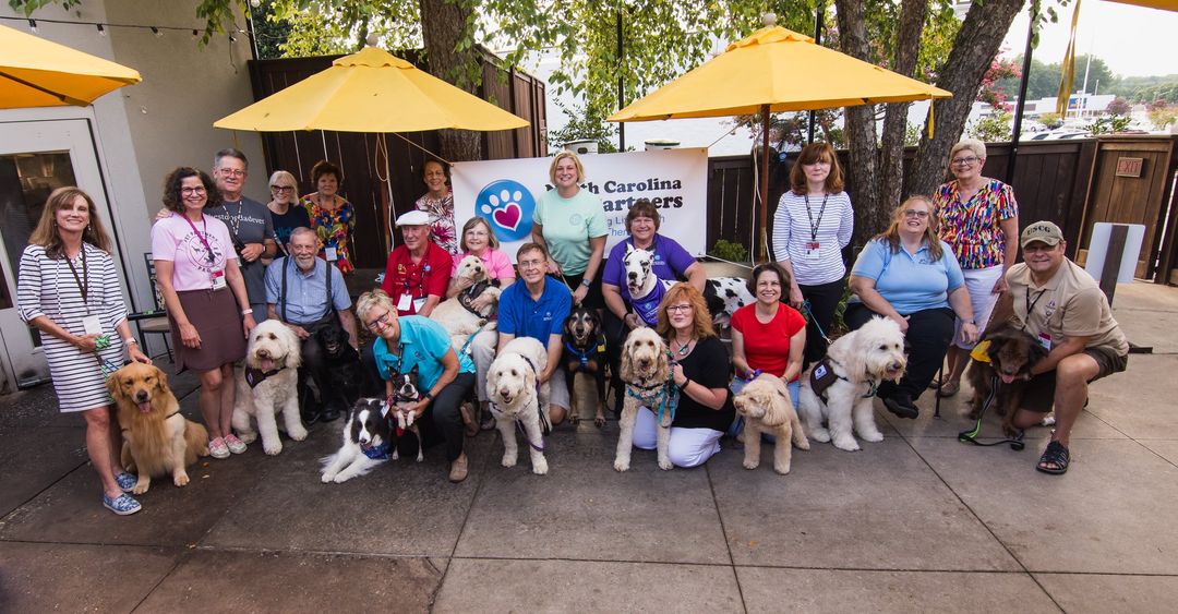A group photo of volunteers with North Carolina Pet Partners.
